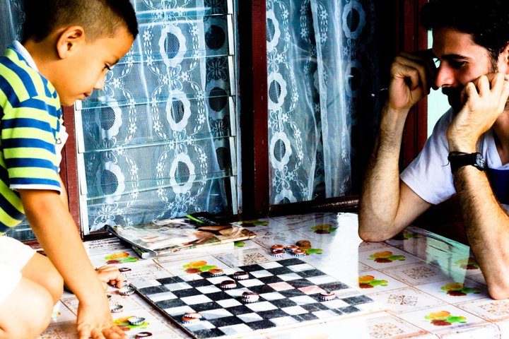 Playing checkers is an easy way to connect in any language.
