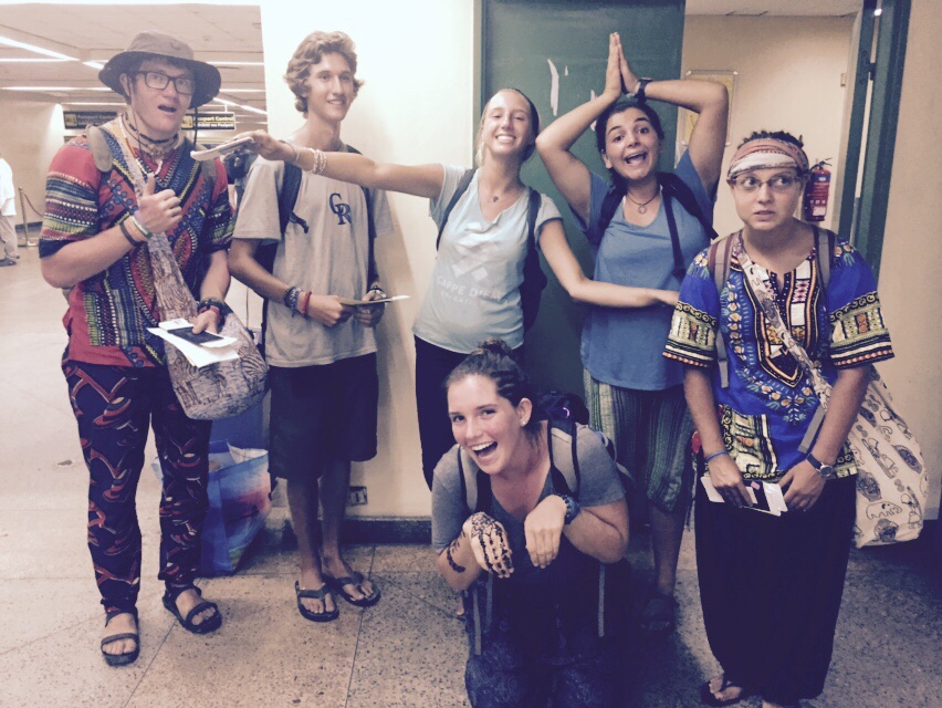 The group at the airport embodying their spirit animals. 